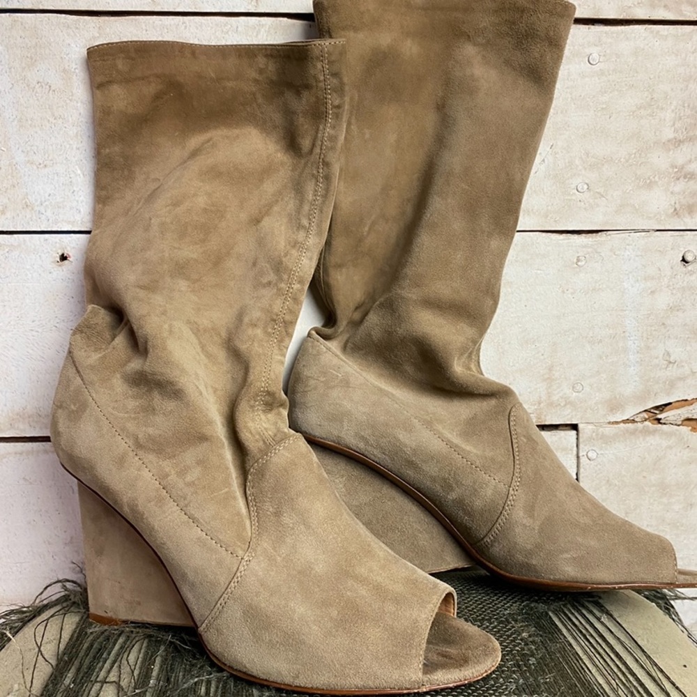 Diane von Furstenberg weaver boots.